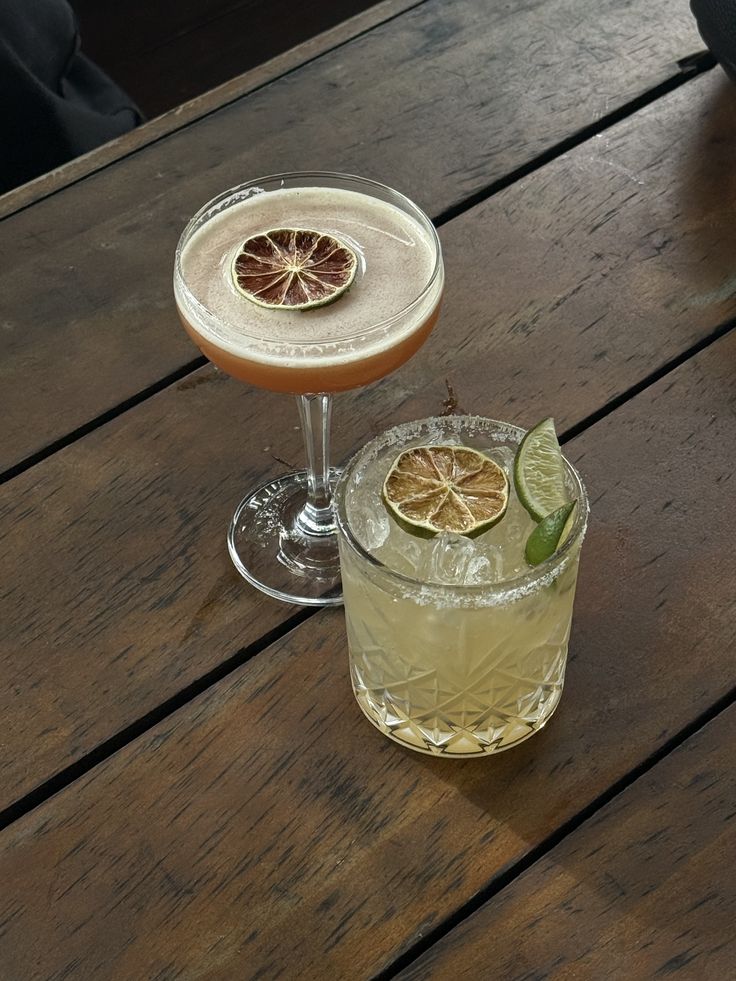 Cocktails and glassware in a relaxed outdoor setting