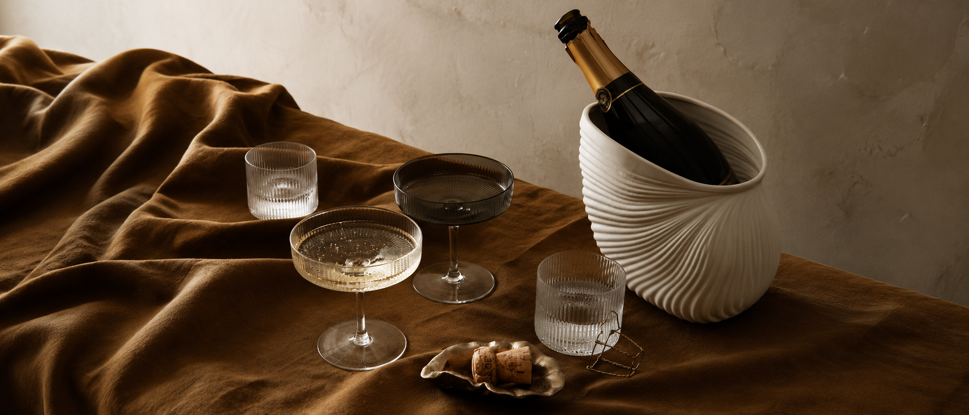 Elegant glassware arranged in a warm everyday setting
